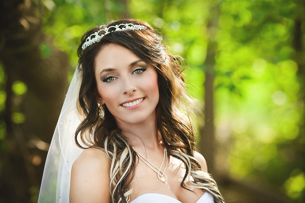 south lyon michigan bride posing in woods