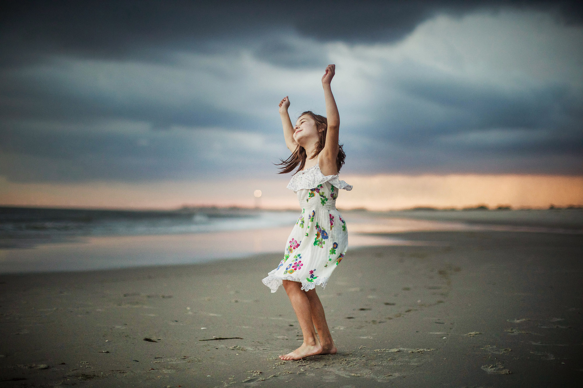 girl dancing on beach sunset NJ