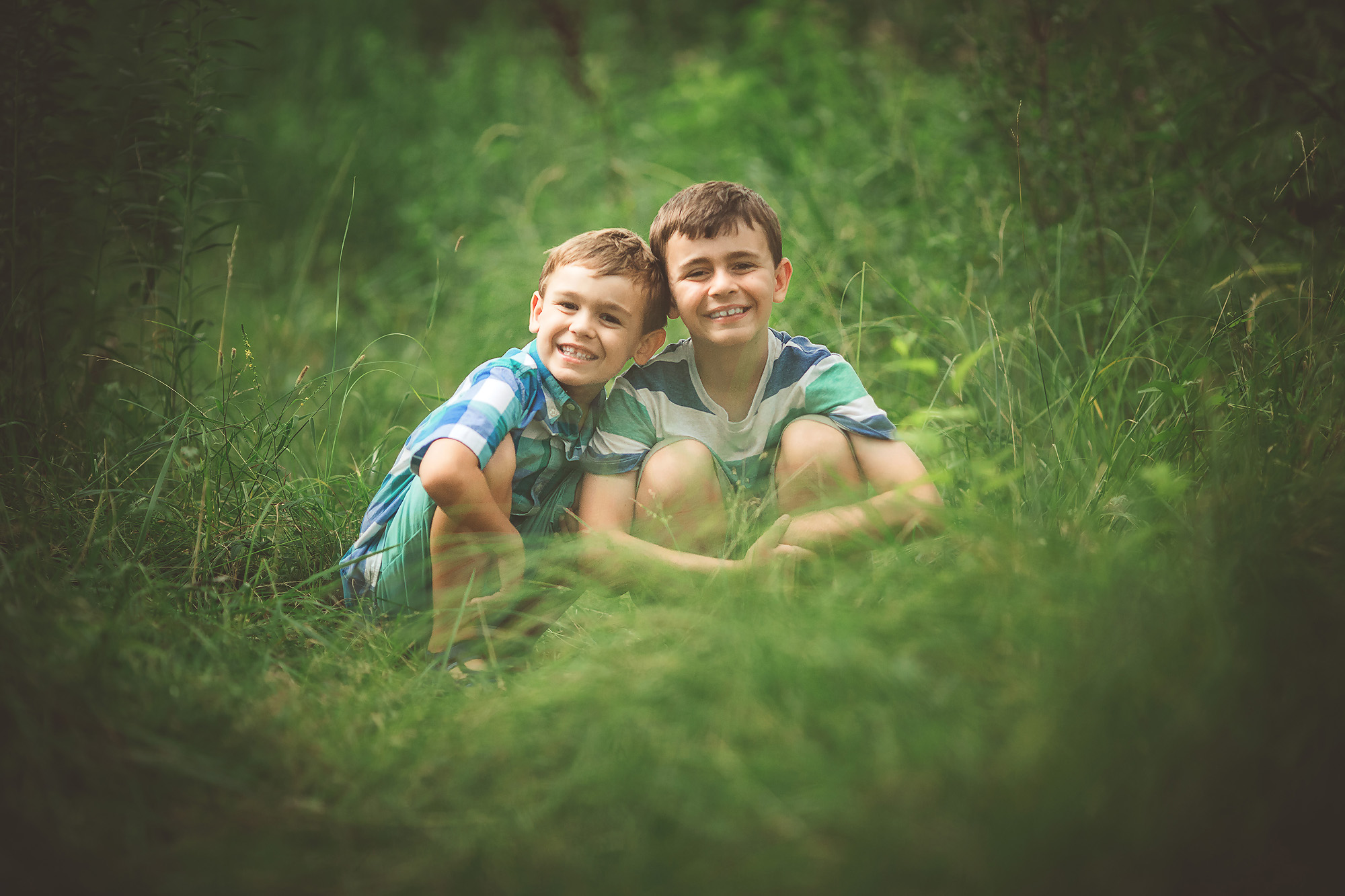 brothers portrait in grass