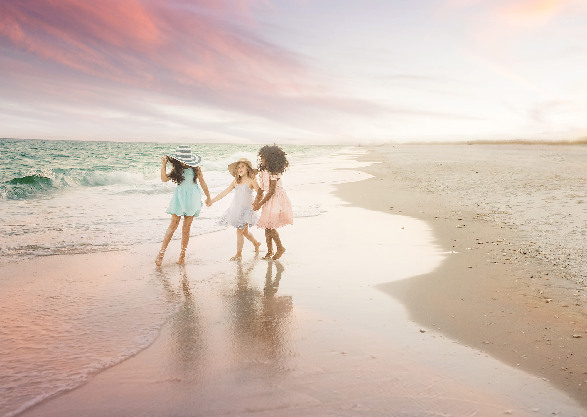 3 girls dancing sunset beach