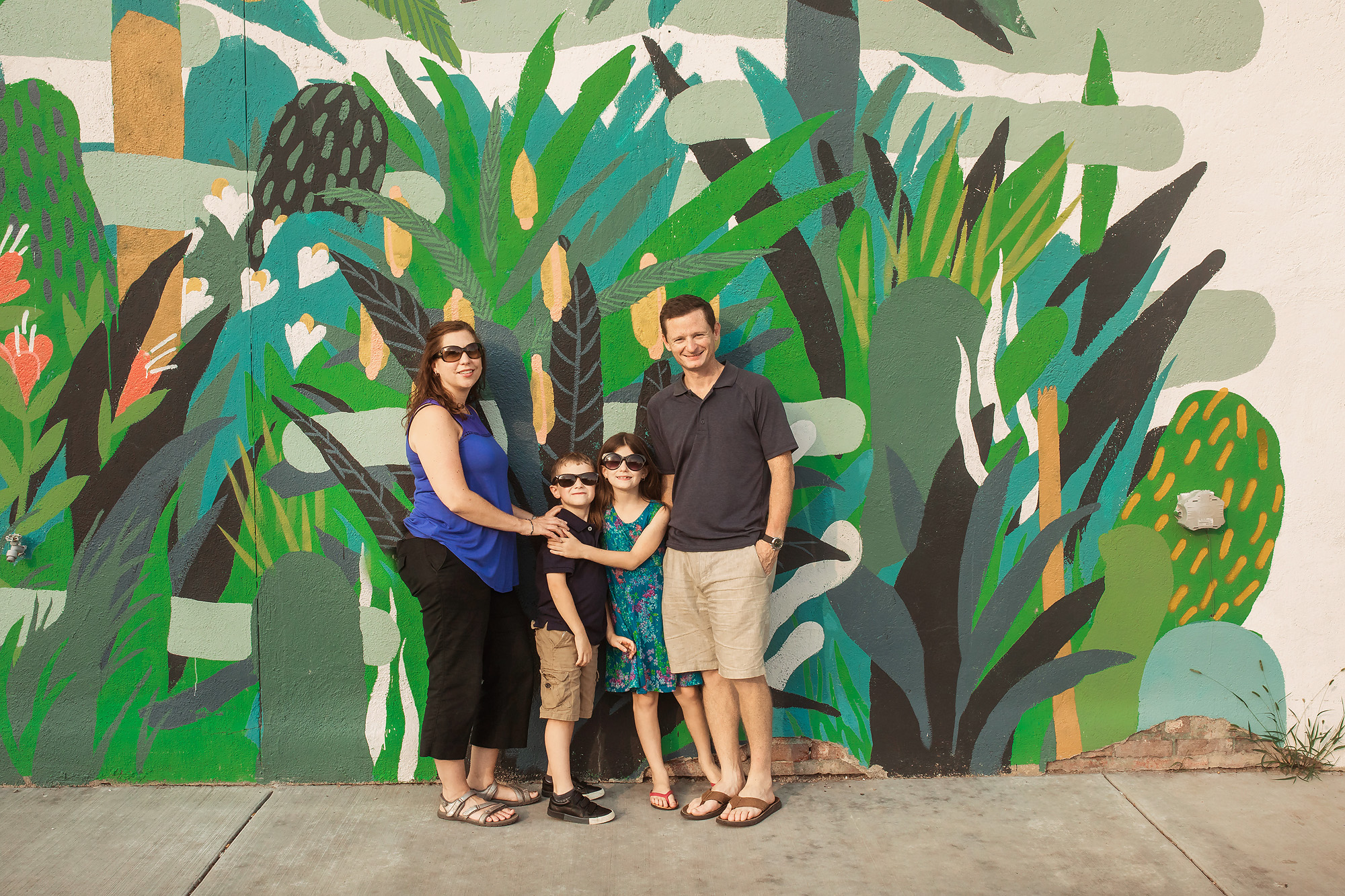 family of four murals detroit portraits
