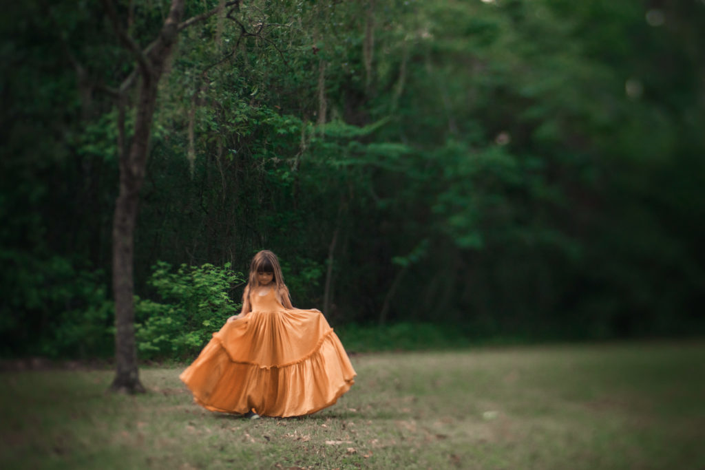 girl under spanish moss tree yellow dress