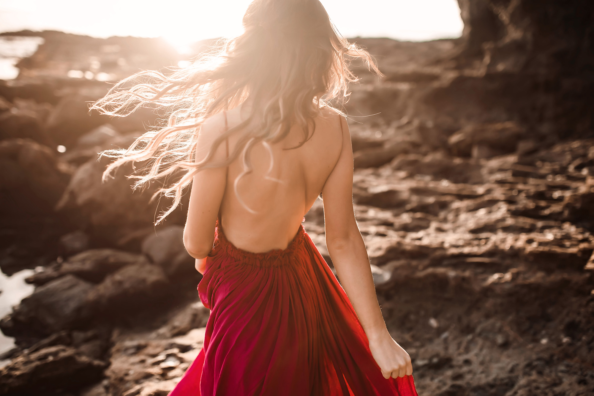 girl dancing red dress sunset light