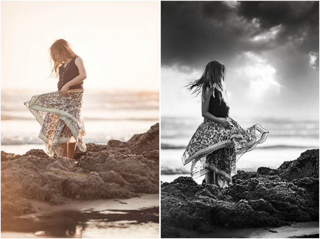 girl spinning skirt on rocks at beach
